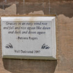 Plaque: Grasses in an easy wind rise and fall and rise again like dawn and dusk and dawn again - Pattiann Rogers Wall dedicated 2007
