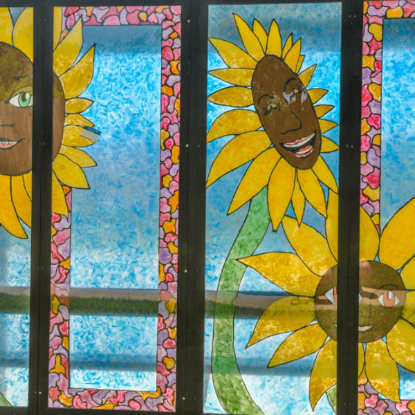 Sunflowers painted on bus shelter, 21st Street North and Chautauqua photo from 2009