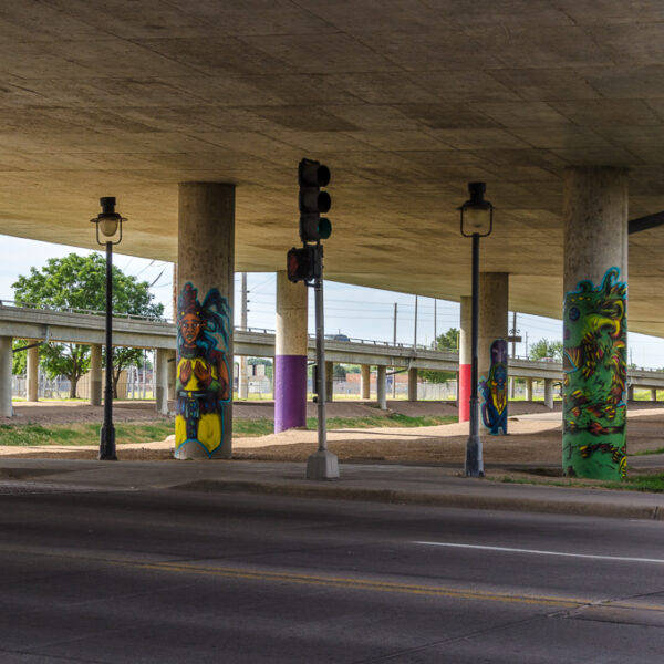 Guardians - overpass columns at Douglas Avenue - by ICT Army of Artists - photo from 2016